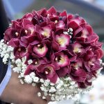"دسته گل عروس سیمبیدیوم زرشکی - انتخابی متفاوت و جذاب برای عروسی شما"