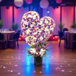 "فریم قلب رنگی از گل‌های زیبا و متنوع که به‌صورت قلبی طراحی شده، یک انتخاب بی‌نظیر برای ابراز احساسات در مناسبت‌های خاص است."