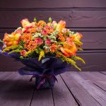 "دسته گل تولد از گالری فلورانس با گل‌های رنگارنگ و شاد برای جشن تولدهای خاص"