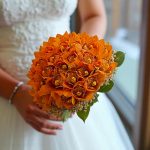 دسته گل عروس سیمبیدیم نارنجی با طراحی شیک و گل‌های طبیعی از گالری فلورانس