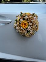 "ماشین عروس با گلهای رنگی طبیعی برای روز عروسی خاص شما از گلفروشی فلورانس"